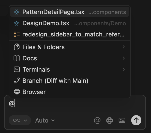 Cursor showing context mentions with @ symbol for referencing files
